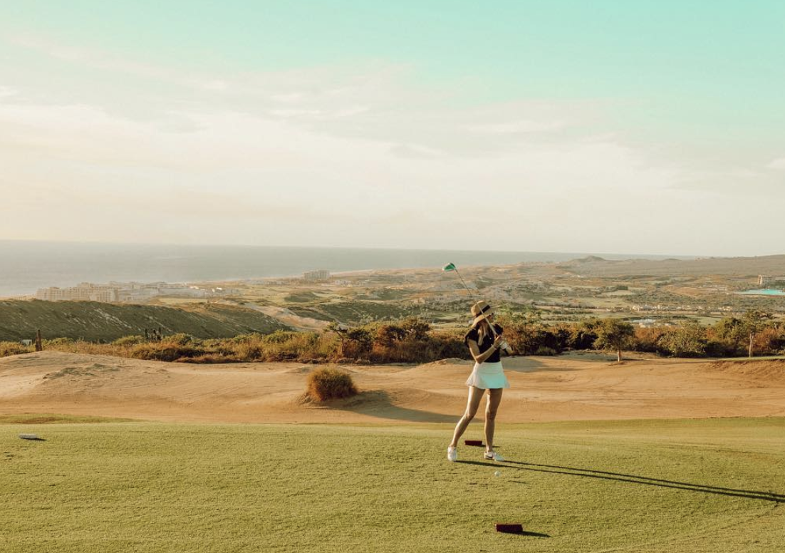 girl playing golf