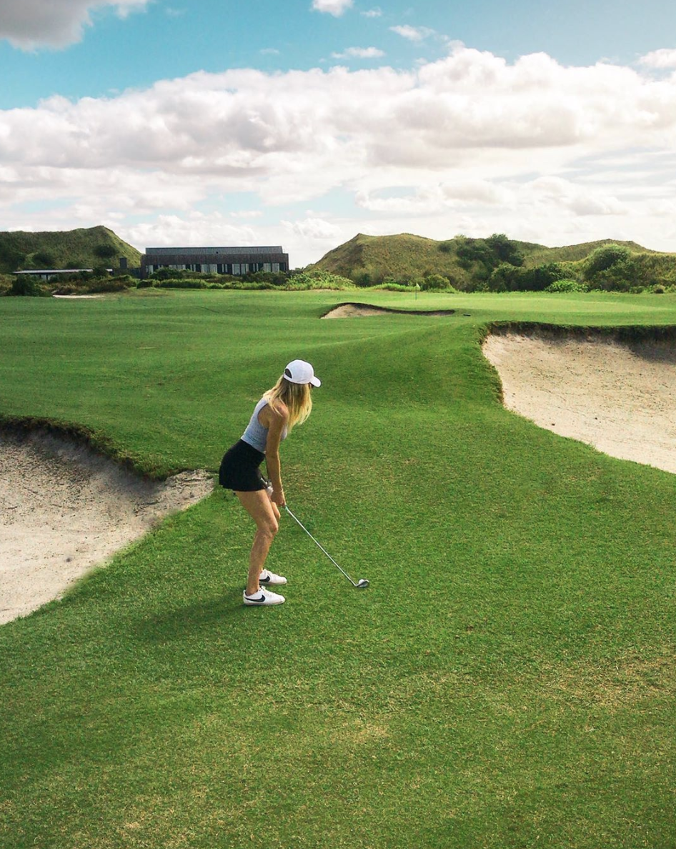 girl golfing